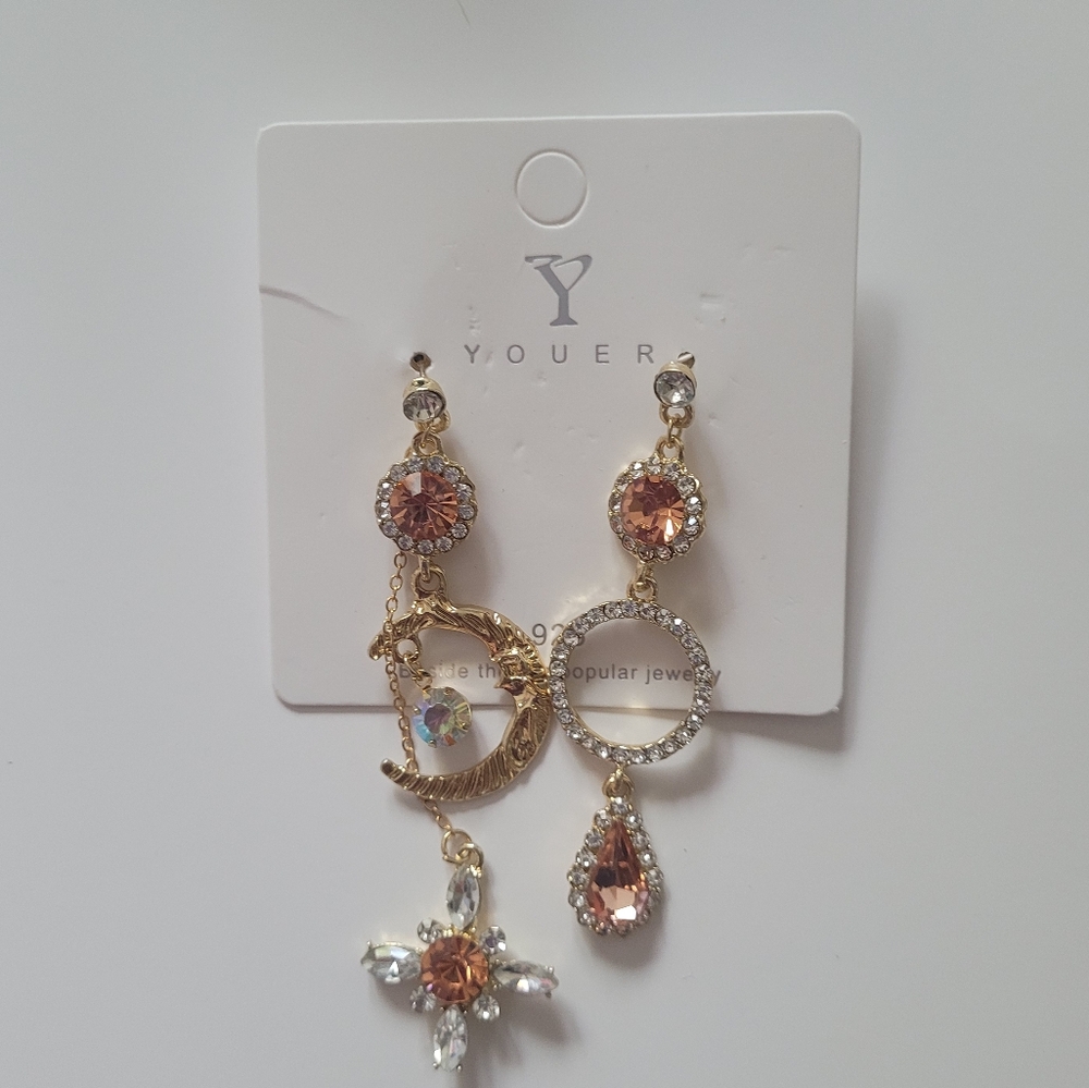 Orange crescent moon asymmetrical earrings